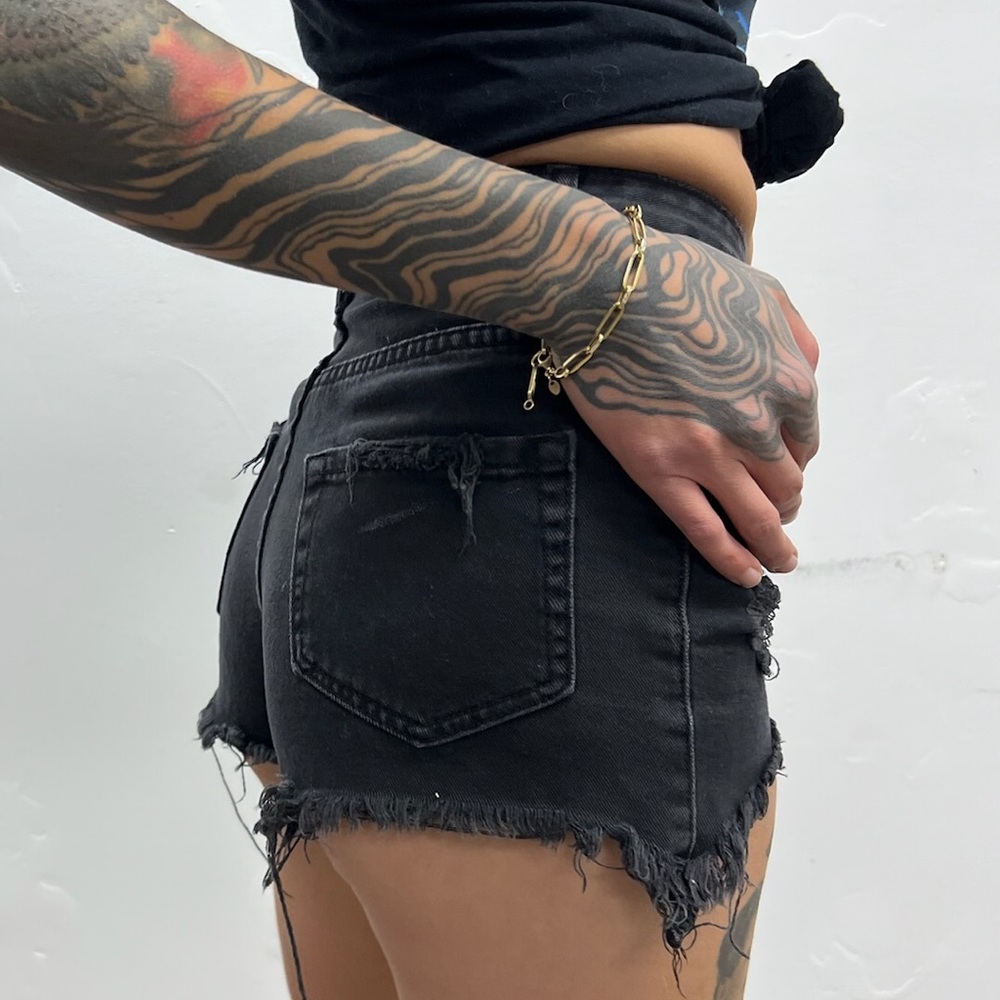 SOLD UNIF high-waisted ripped jean shorts